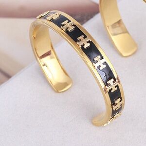 Tory Burch cuff bracelet black gold